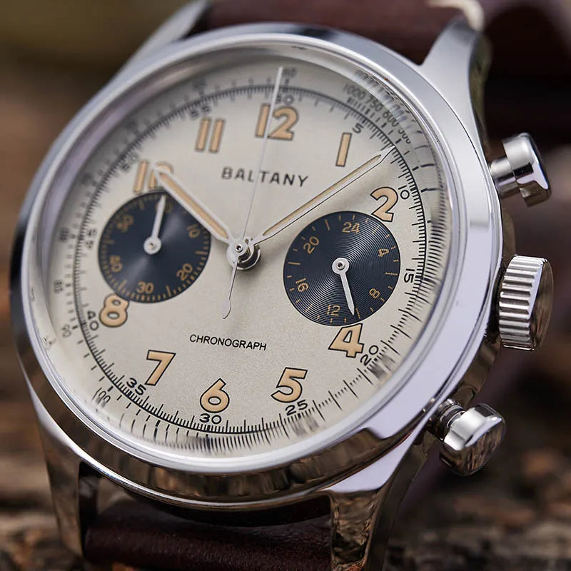 Close-up of the cream dial, subdials and steel case of the Baltany Panda chronograph